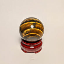 Load image into Gallery viewer, Tiger's Eye sphere on stand -  Crystal collection